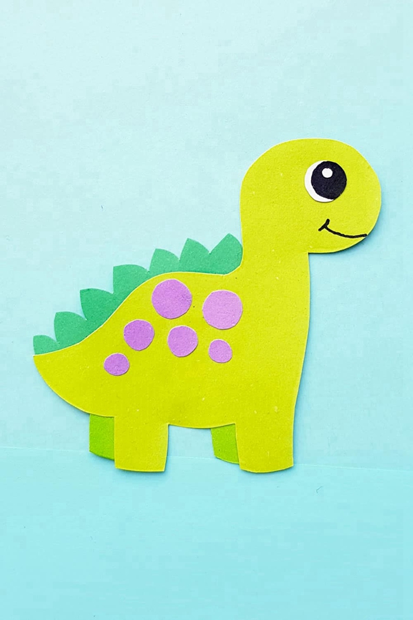 Kids' easy paper dinosaur craft using colorful construction paper