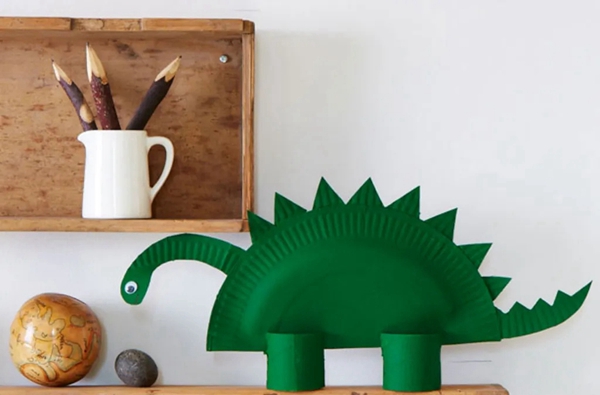 Child's handmade paper dinosaur craft