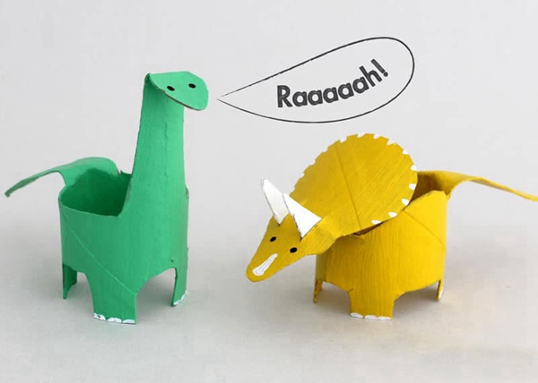 Colorful dinosaurs made from recycled toilet rolls for kids' craft activity