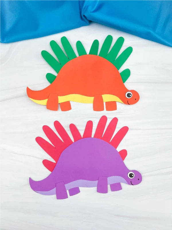 Child's handprint turned into a stegosaurus craft