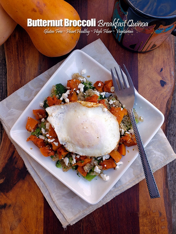 A vibrant and nutritious breakfast bowl of Butternut Broccoli Breakfast Quinoa, featuring caramelized butternut squash, broccoli, and quinoa, topped with feta and eggs.