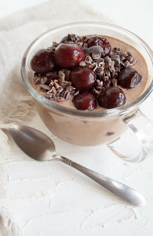 A bowl of Chocolate Cherry Chia Pudding, combining the rich taste of chocolate with the tartness of cherries for a delightful treat.