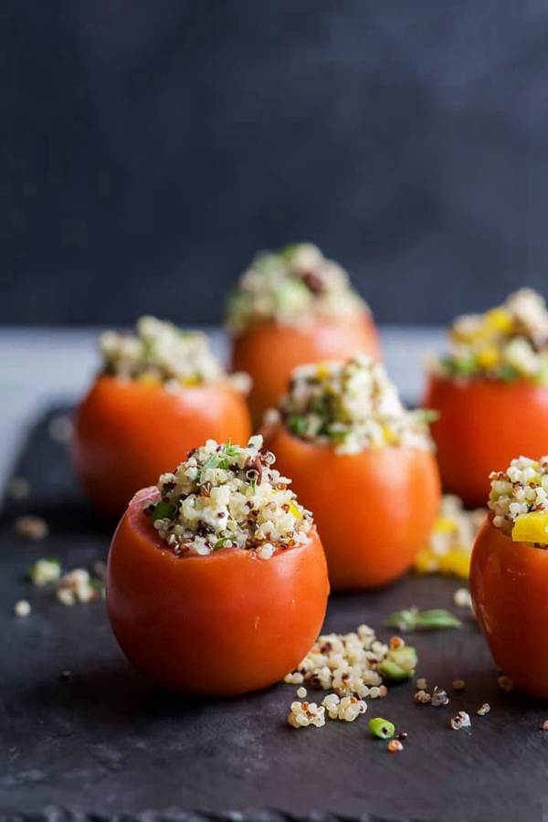 Freshly made Mediterranean Quinoa Stuffed Tomatoes, vibrant and appetizing.