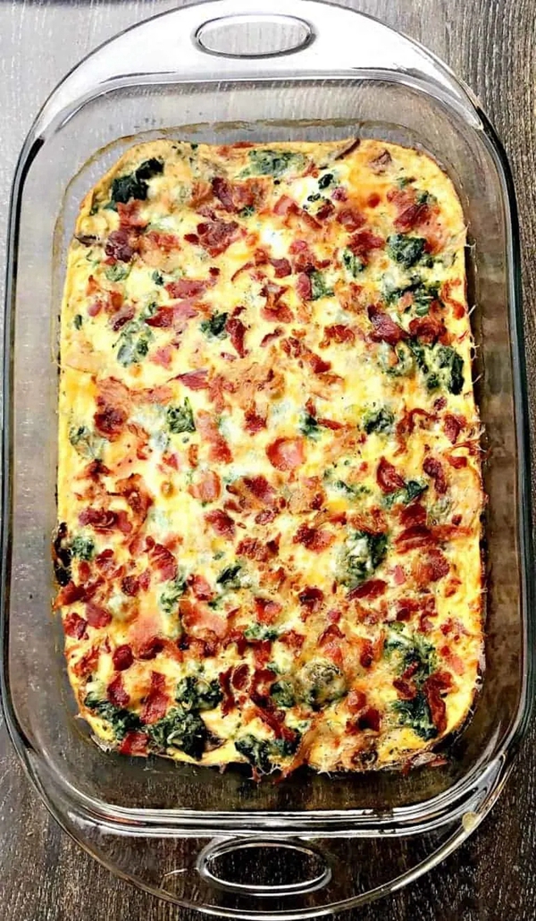 A delicious and healthy Low-Carb Bacon, Egg, and Spinach Breakfast Casserole, ideal for keto dieters, featuring a tasty mix of cheese, mushrooms, and peppers.
